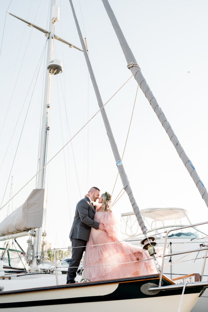 Montrose Harbor sailboat bride and groom portrait by chicago fine art wedding photographer joshua harrison